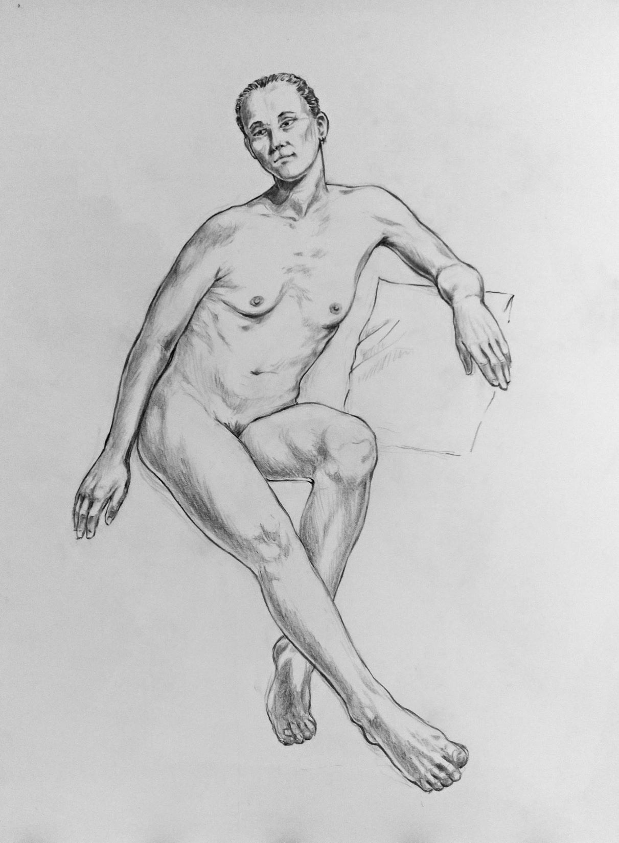 Woman, seated, leg extended.