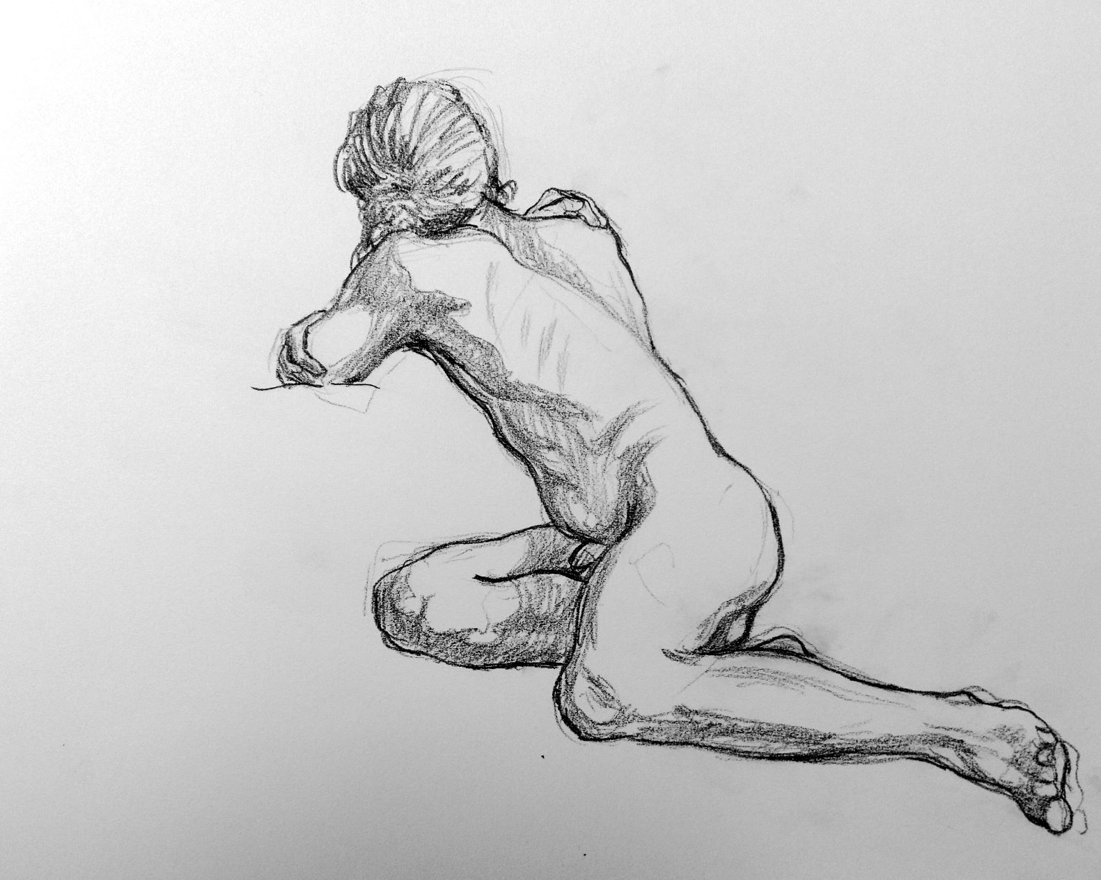 Man, leaning, rear view.