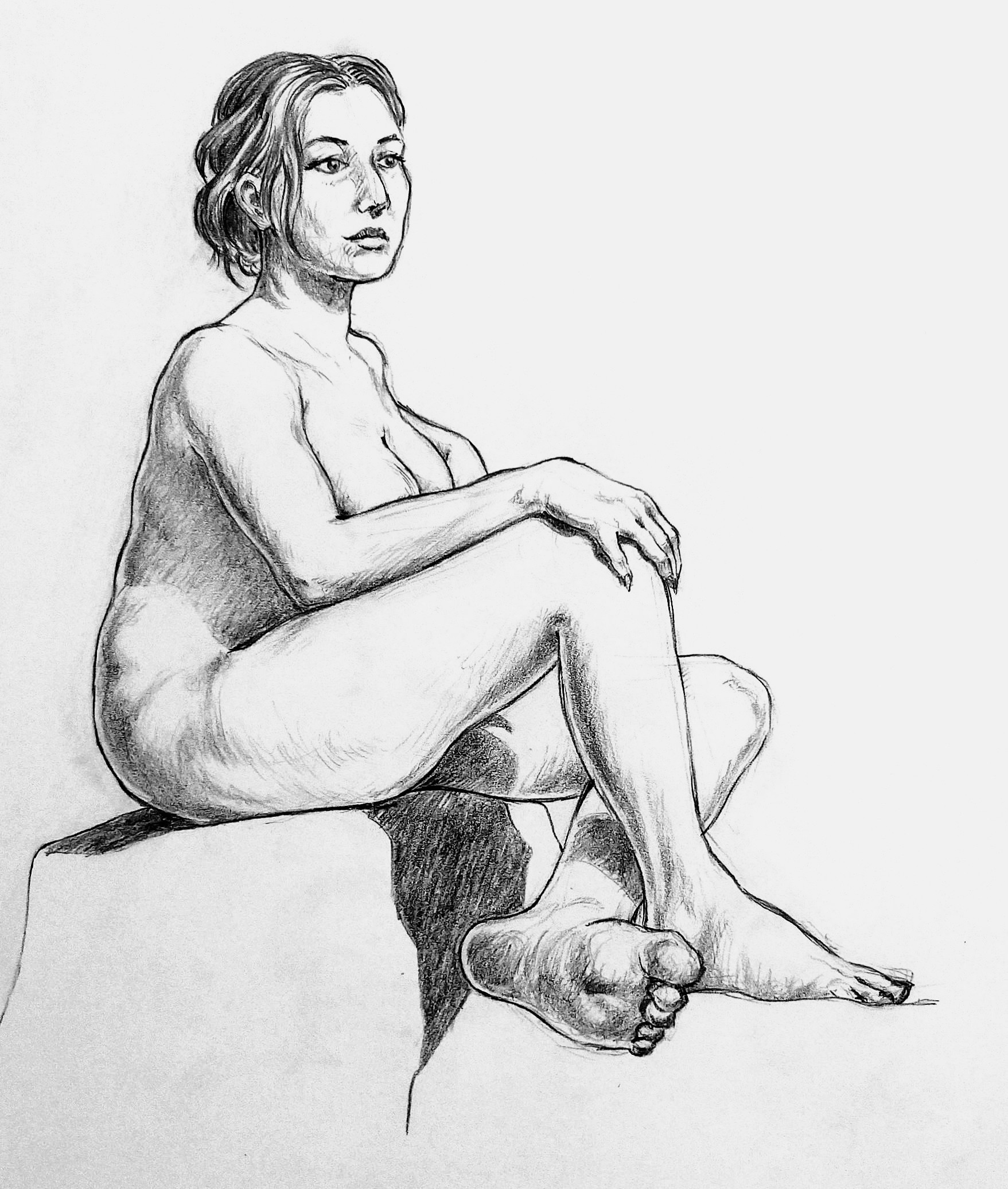 Woman, seated.