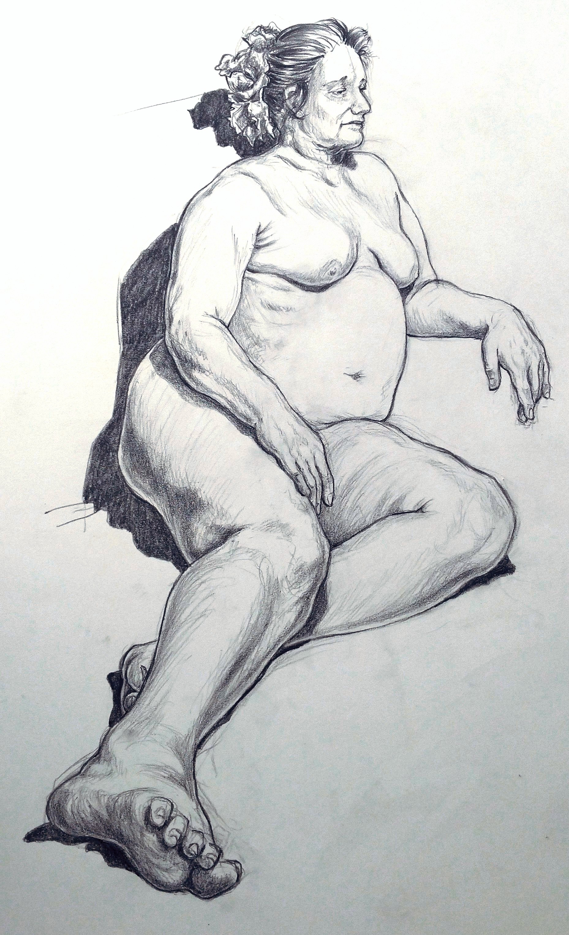 Older woman, reclining.